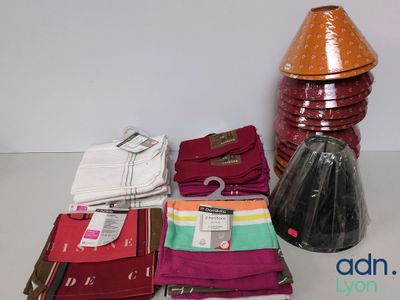 many different types of clothing on display on the table
