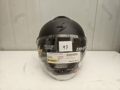 an image of a helmet with a sticker on it sitting on a table
