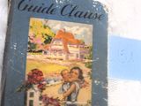 un livre sur lequel figure la photo d'une femme et d'un enfant