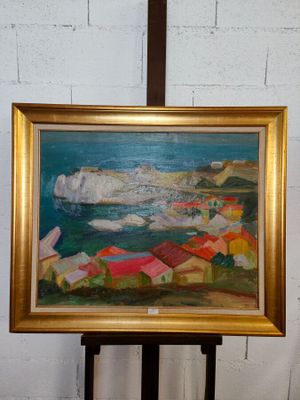 une image d'un tableau sur un chevalet dans une pièce