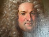 painting of a man with long hair and a beard in a black coat