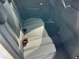 the back seat of a car with a seat belt in it