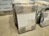 boxes of mattresses are stacked on top of each other in a warehouse
