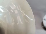 a cup that has some kind of animal on it