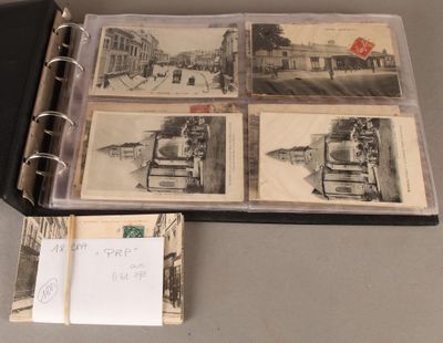 un classeur sur lequel figurent des photos de bâtiments et une carte postale