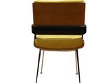 yellow and black chair against a white background with a white background