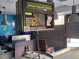 a machine that is sitting in the middle of a kitchen