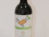 a bottle of wine that is sitting on a table