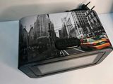 a box that has a picture of a city on it