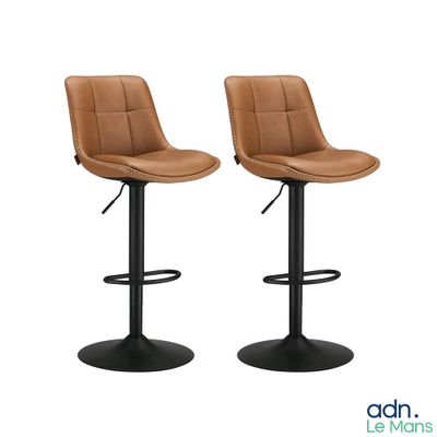 a pair of brown leather bar stools with black metal legs