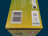 a yellow box that has a green label on it
