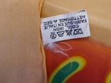 a label on the back of a stuffed animal