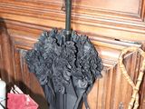 two umbrellas that are hanging on a wall