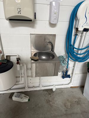 a sink and a toilet in a small room