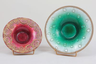 two plates that are sitting side by side on a table