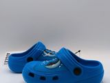 blue children ' s crocs with a shark design on the side