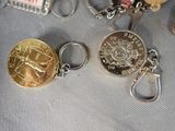 two different types of key chains that are on a table