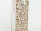 an image of a book with a white cover and a red line on it