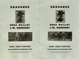 deux affiches sur le mur d'un immeuble, avec des images d'animaux