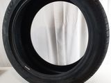 an image of a tire sitting on top of a white surface