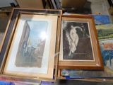 two framed pictures of a woman on a table