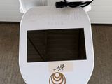 an image of a white toilet sitting on top of a floor next to a wall