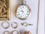 many different types of jewelry including a watch, ring, bracelet, and ring