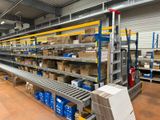 many shelves with boxes and boxes on them in a warehouse