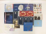 a lot of books that are on the table