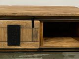 a wooden table with a black towel on top of it