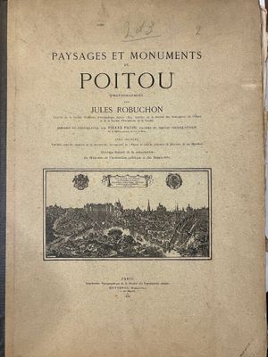an old book with a picture of a city on it