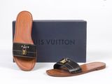 Sandales Louis Vuitton en cuir noir avec finitions dorées
