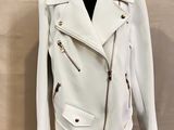 a white leather jacket on a mannequin mannequin mannequin mannequin mannequin mannequin mannequin mannequin manne