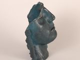 an image of a sculpture of a man ' s head on a white surface