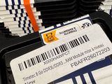a lot of ram cards on a tray with a price tag