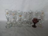 a lot of wine glasses that are sitting on a table