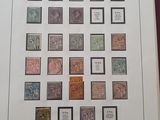 a picture of a picture of a collection of stamps on display