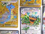 many different types of pokemon cards on the table