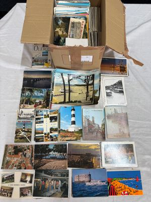 a box full of postcards sitting on top of a table