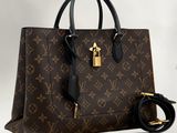 louis vuitton monogramet leather handbag with gold hardware