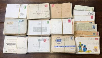 a lot of old letters and envelopes on the table