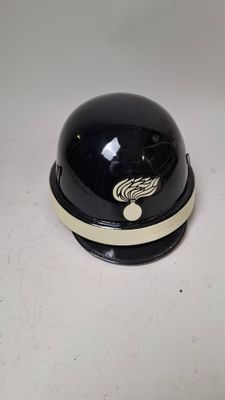 a black helmet with a white stripe on it