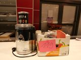 a blender sitting on a counter next to a box of food