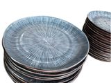 a lot of plates that are stacked on top of each other