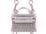 silver chain purse with a chain strap and a clasp