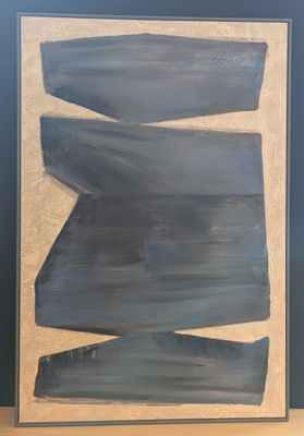 painting of a blue and white abstract painting on a wooden table