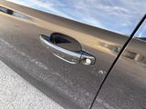 a close up of a door handle on a car
