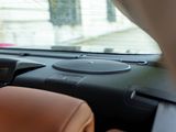a car dashboard with a cell phone in it