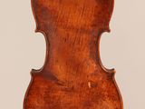 an old violin with a wooden back and a long neck