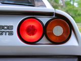 a close up of the tail lights of a car